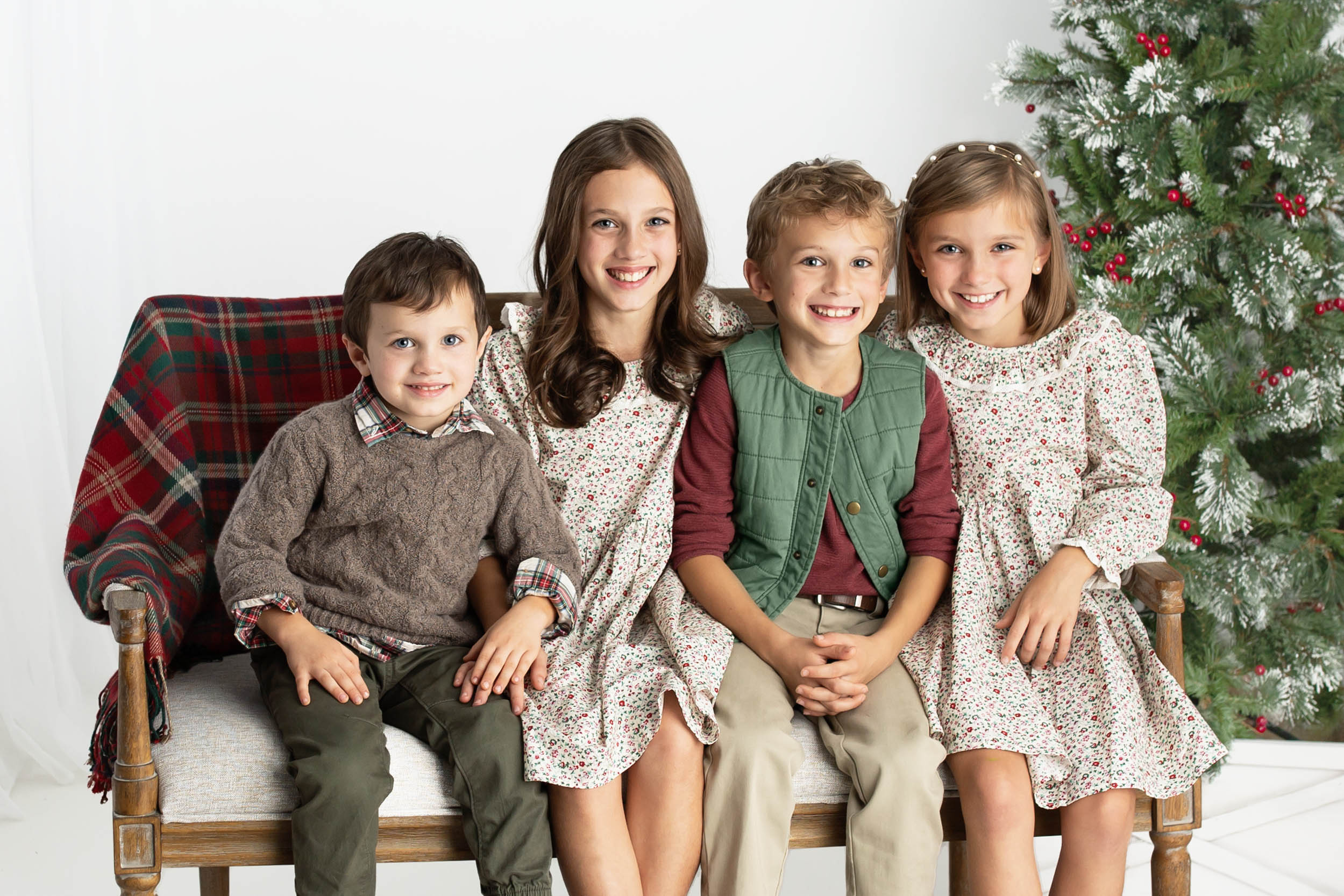 Christmas picture children sitting on bench